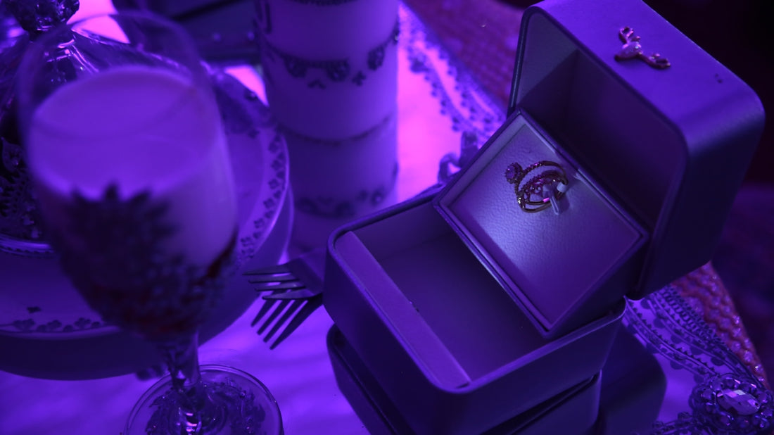 a purple lit table with a purple lit table cloth and a purple lit table cloth