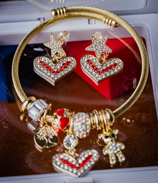 a close up of a bunch of jewelry on a table