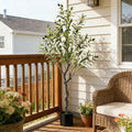 Artificial olive tree with green leaves and black olives in black pot for patio or porch decor