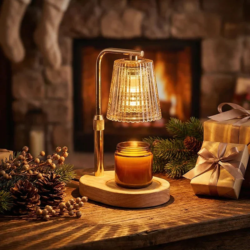 Glass candle warmer with gold metal stand, wooden base, and ribbed shade for cozy home ambiance