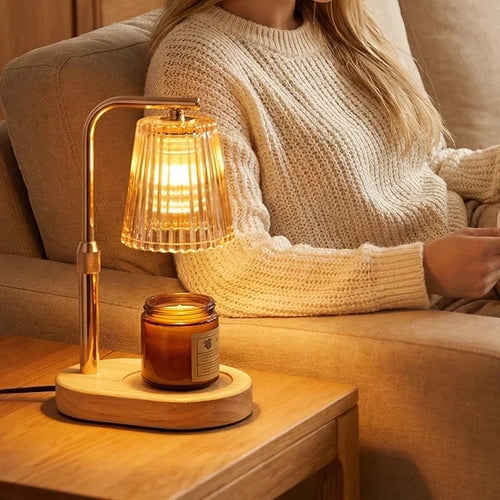 Wooden base lamp with pleated glass shade and amber candle, ideal for cozy home lighting