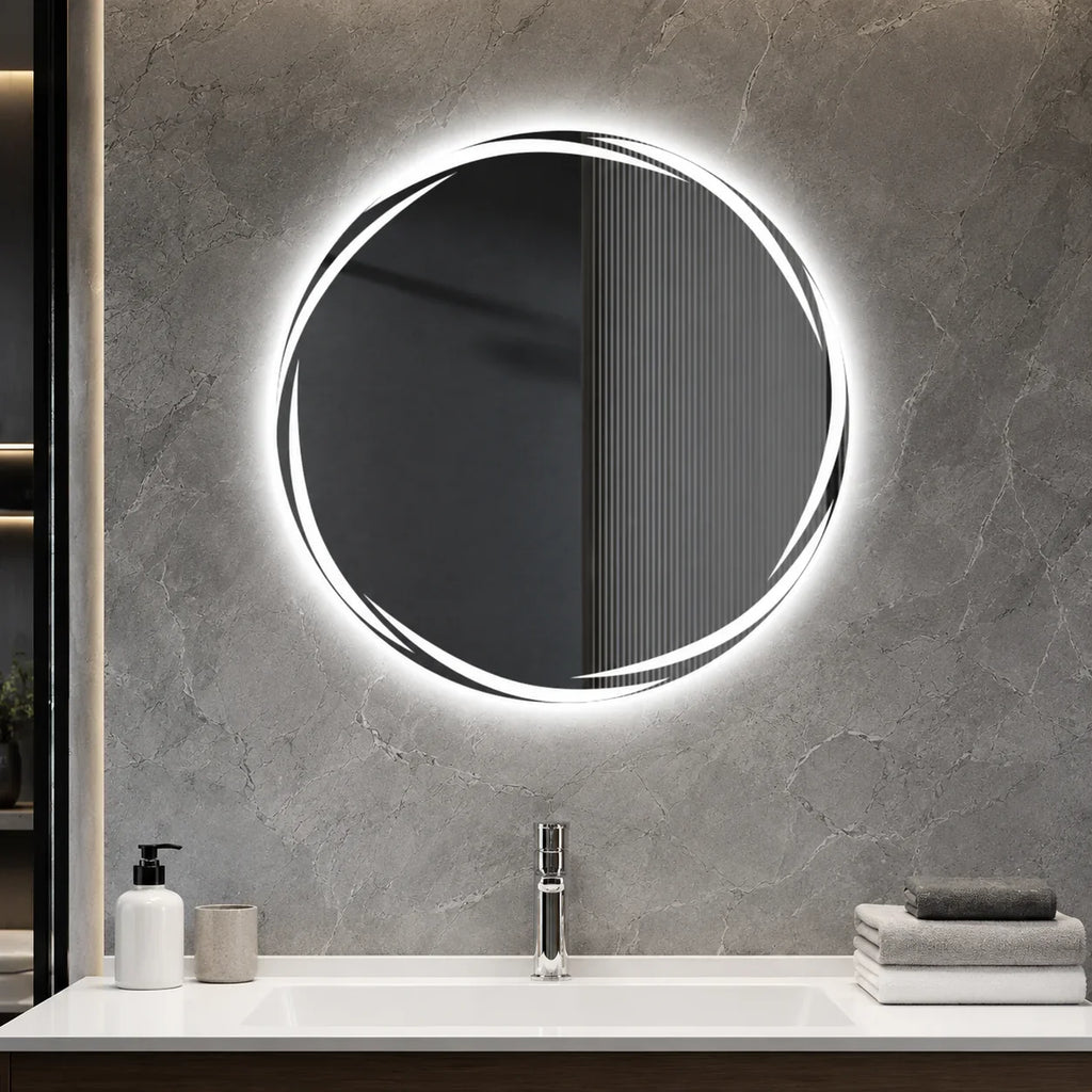 Round LED bathroom mirror with sleek frame, mounted on gray marble wall above modern vanity sink