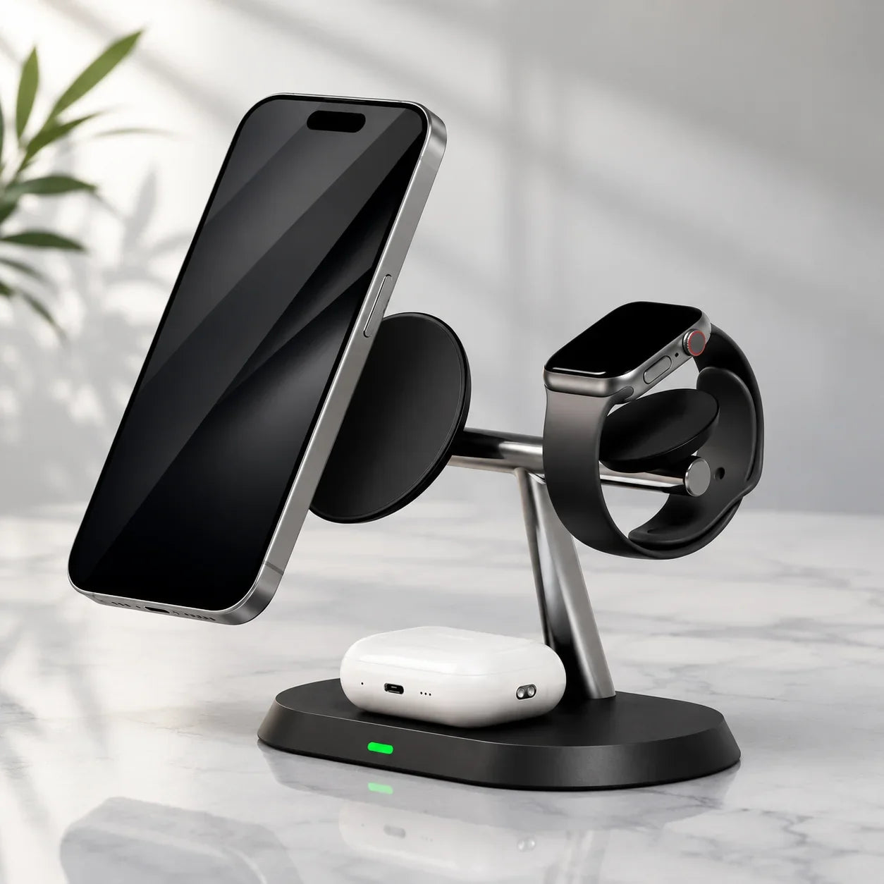 Black wireless charging station for phone, smartwatch, and earbuds on marble countertop