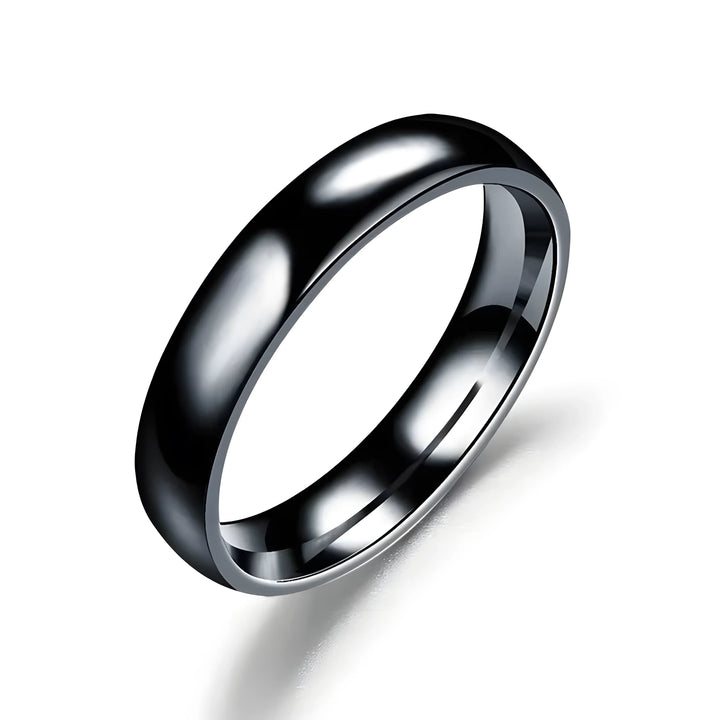 Black ceramic wedding band with polished finish, minimalist style
