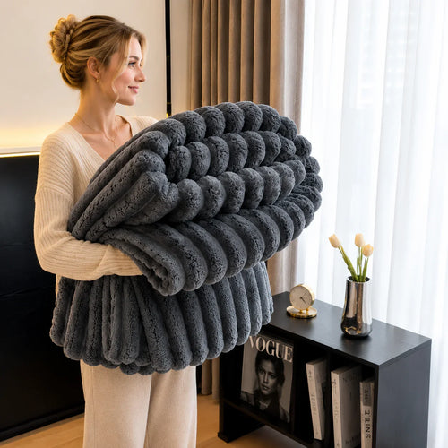 Gray plush chunky knit blanket for cozy bedroom or living room comfort