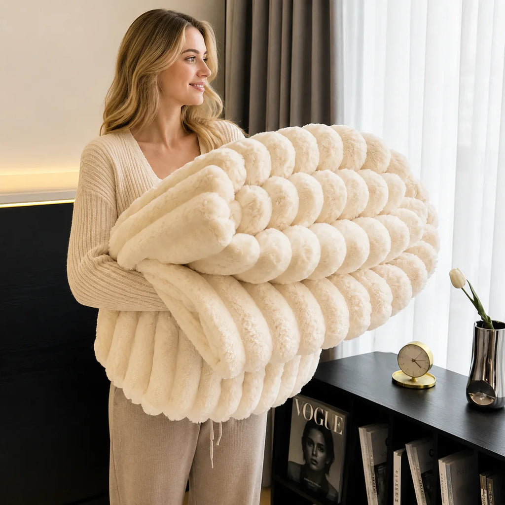 Cream faux fur chunky knit blanket for cozy bedroom or living room comfort