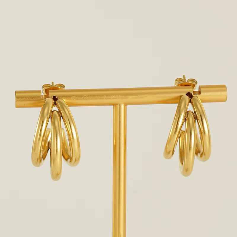 Elevate Your Style with the 4-Piece Irregular Gold Claw Stud Earring Set