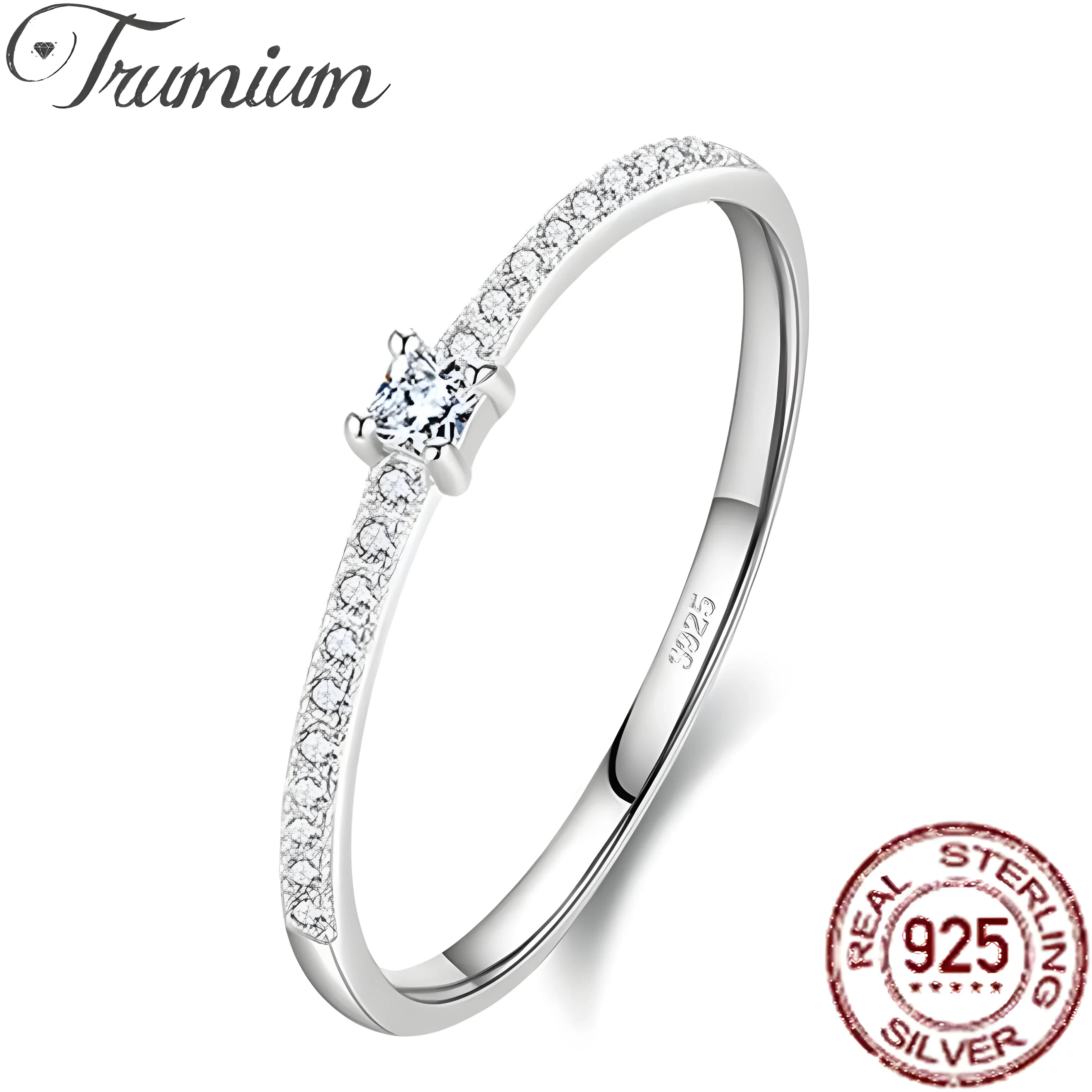 Eternal Spark Set dainty sterling silver ring with solitaire and pavé white stones, minimal style.