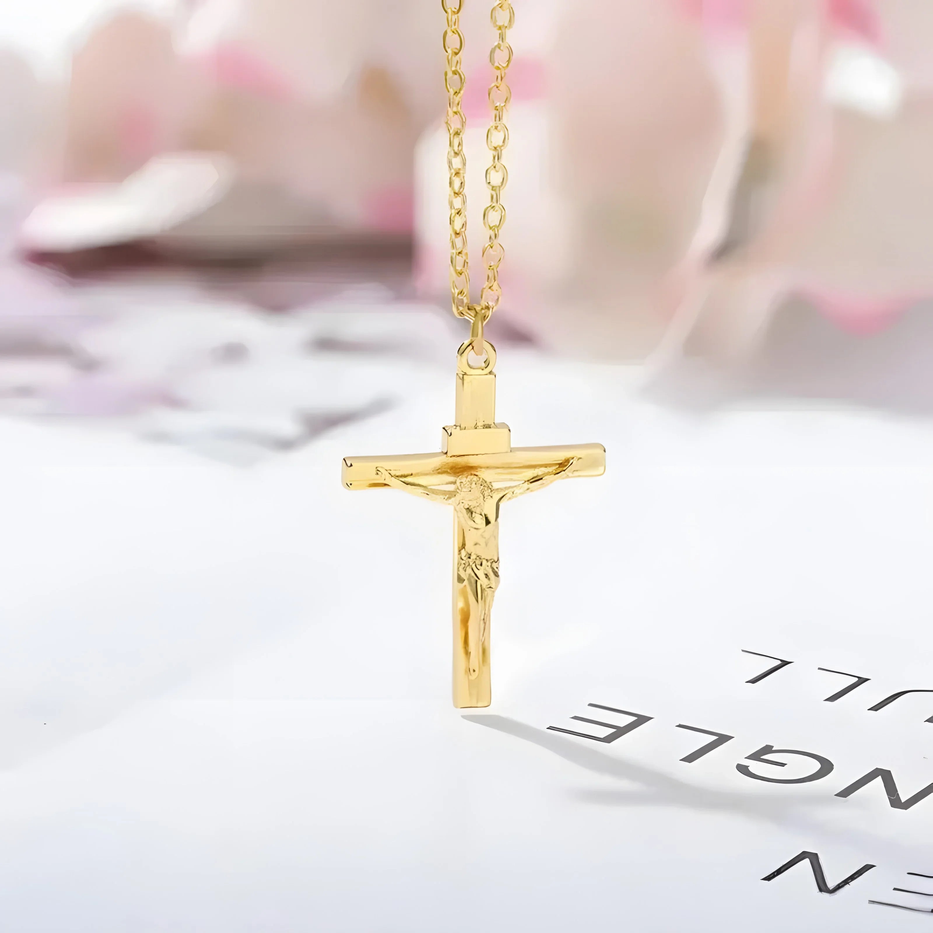 Gold crucifix pendant necklace with minimal design, crafted for timeless style and everyday wear