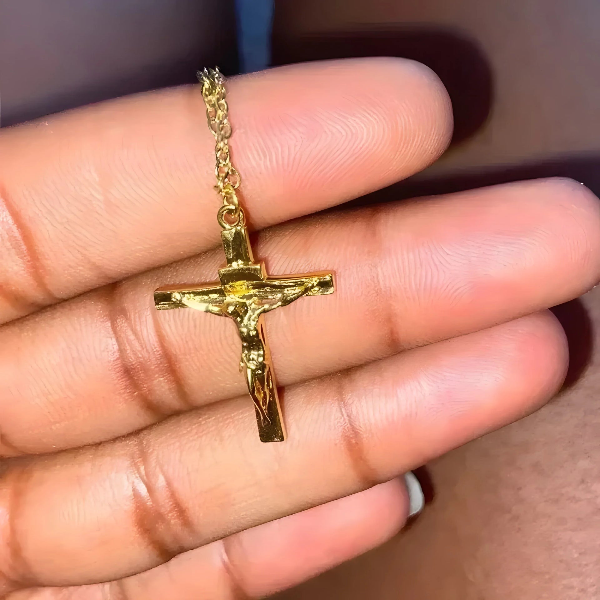 Gold crucifix pendant necklace with minimal design, crafted for timeless everyday style