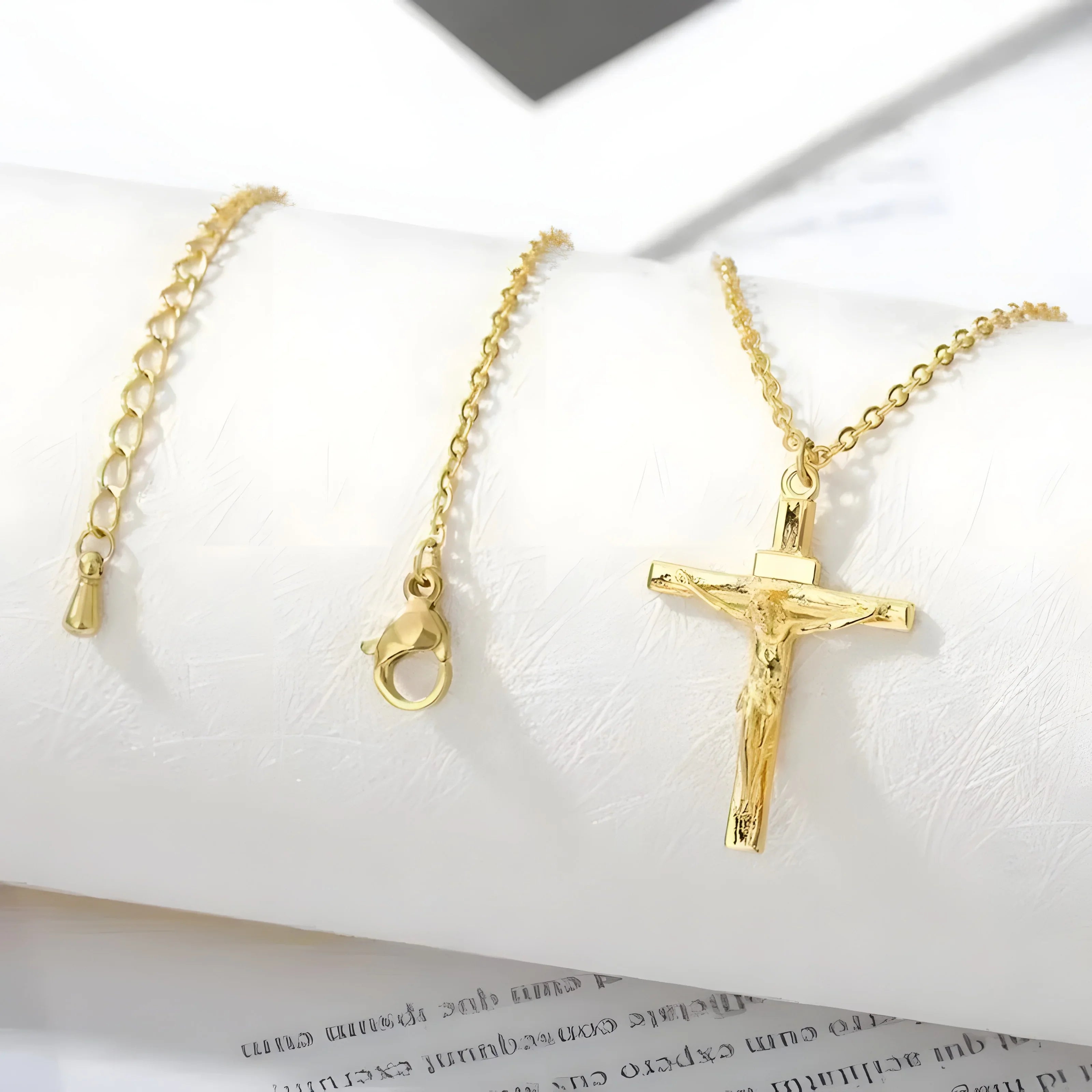 Gold crucifix pendant necklace with chain, minimalist design, yellow gold tone, everyday wear
