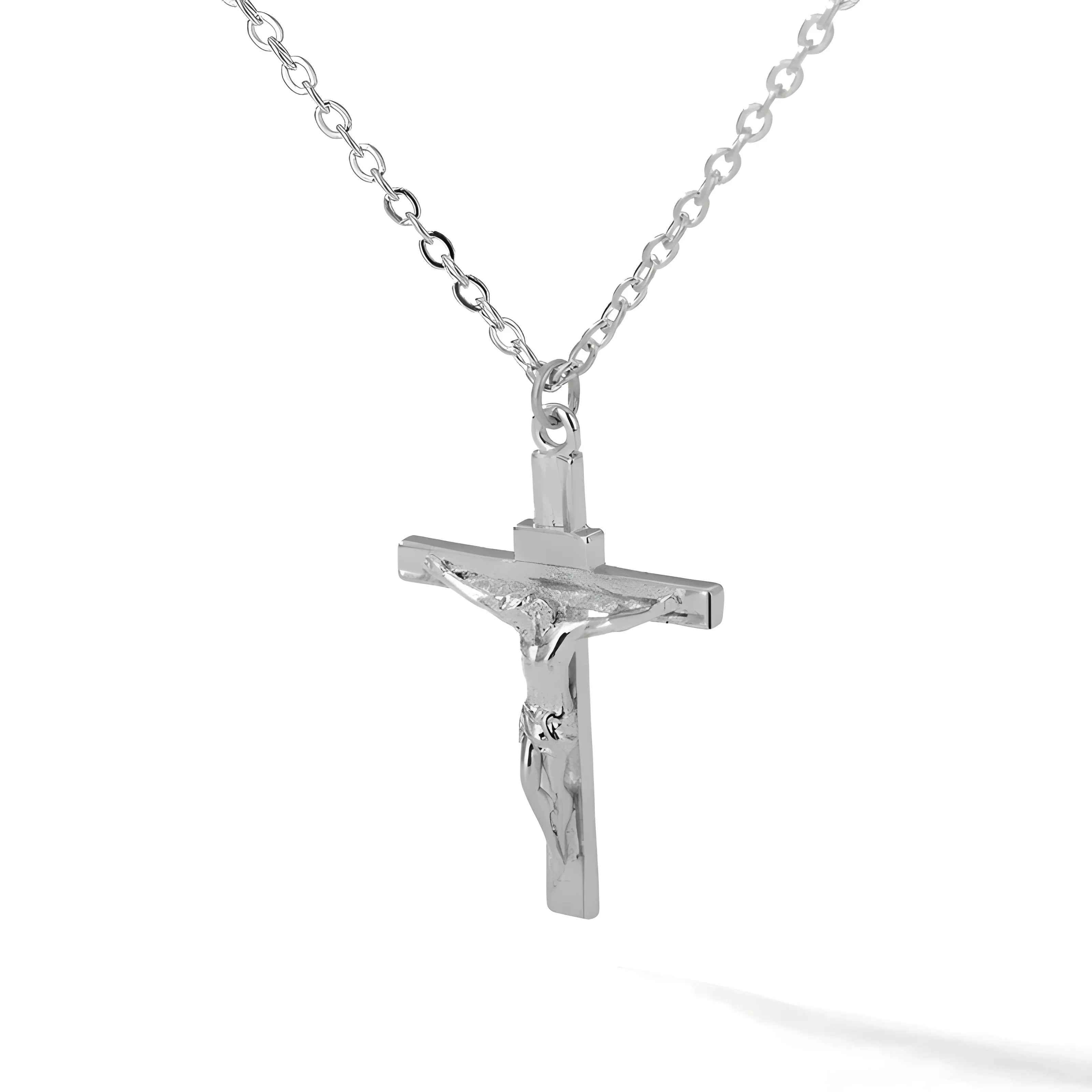 Silver crucifix pendant necklace with minimal chain, sleek religious jewelry design
