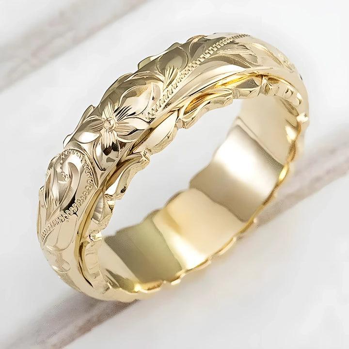 Gold floral engraved ring, elegant design, high-quality material, timeless style