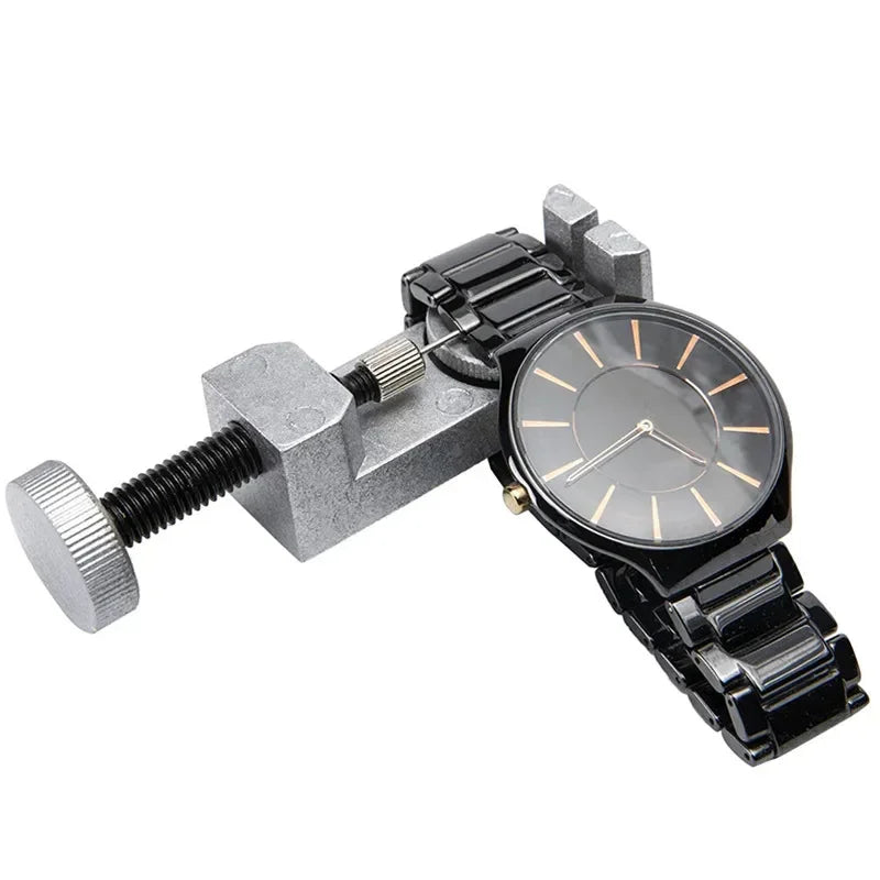 Band strap link pin remover tool with black metal watch, minimal style, silver and black tones