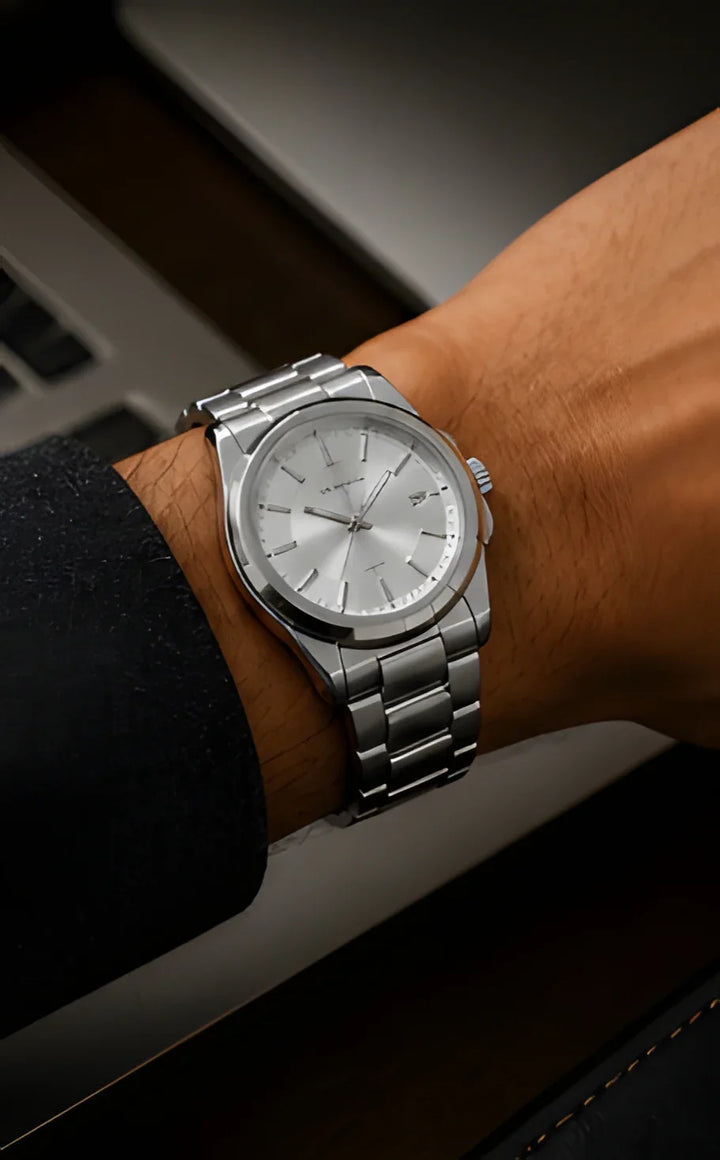 Signature watch, silver stainless steel, minimal design, classic men's jewelry, on wrist