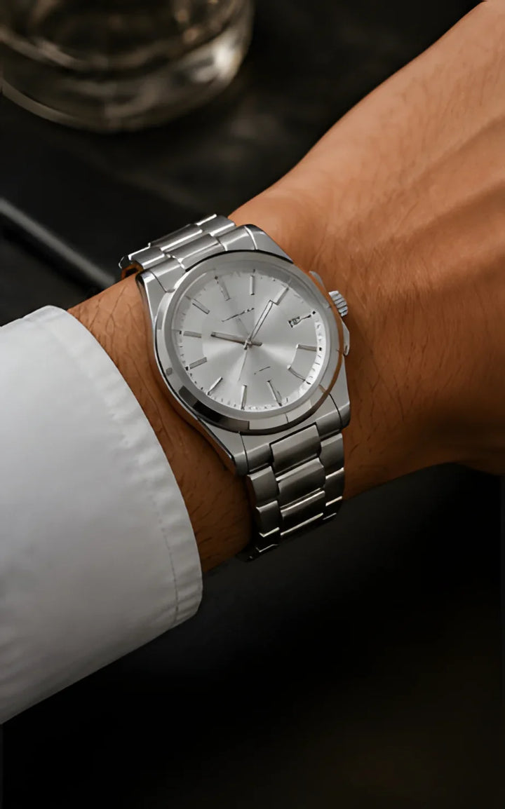 Signature watch, silver stainless steel, minimal design, classic men’s wristwatch style