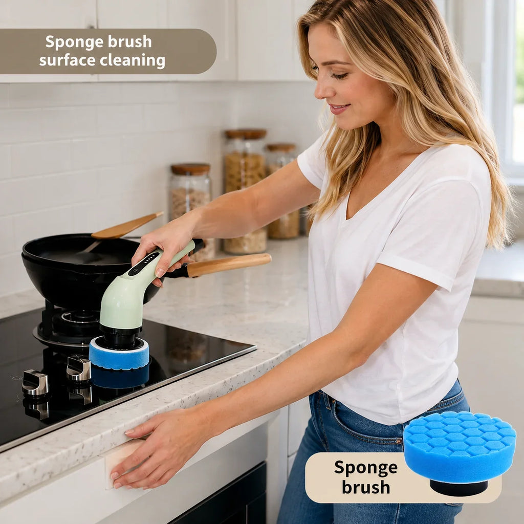 Woman using a light green and blue electric sponge brush to clean a black glass cooktop.