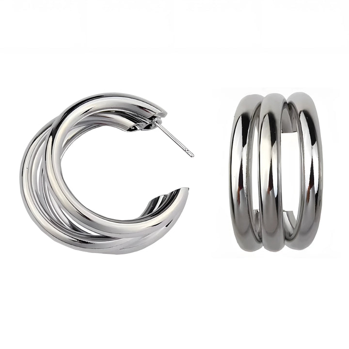 Silver triple hoop earrings, minimalist style, polished metal, modern design
