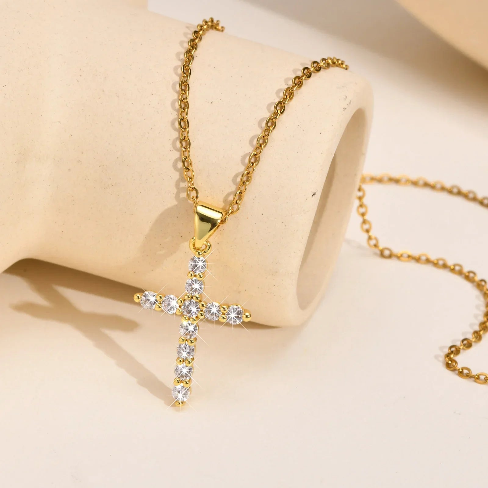 Gold cross necklace with clear crystals, minimal style pendant on chain
