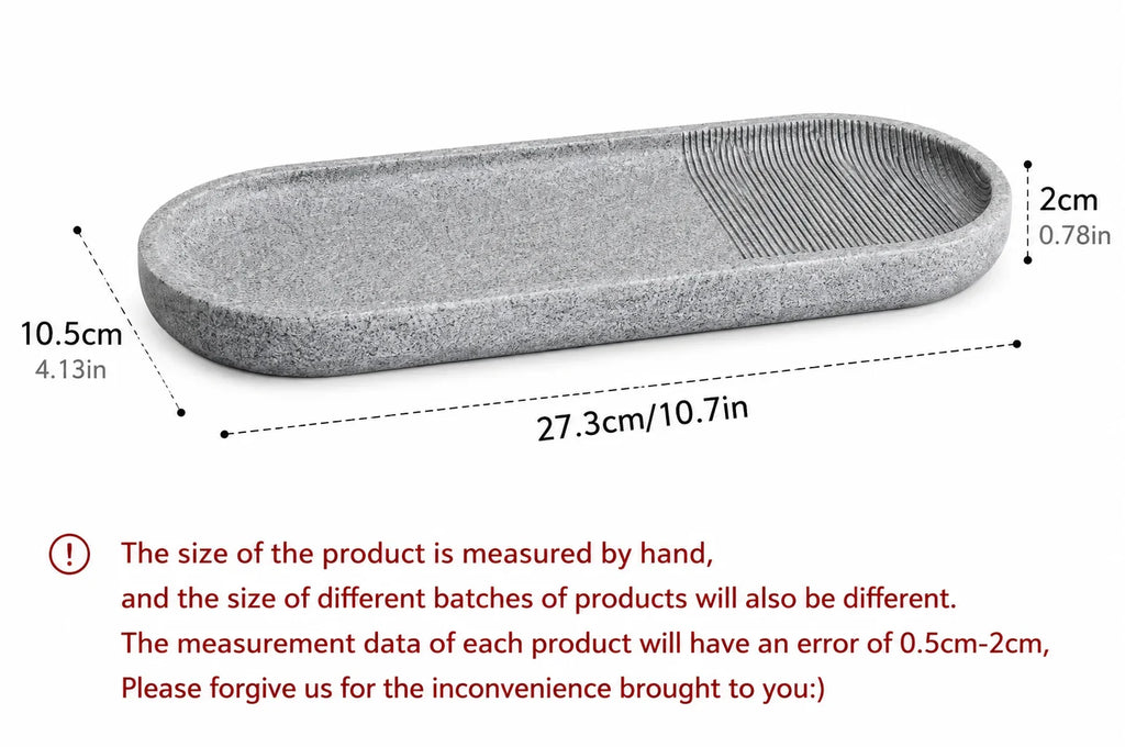 Gray textured oval tray with ridged section for kitchen or bathroom organization