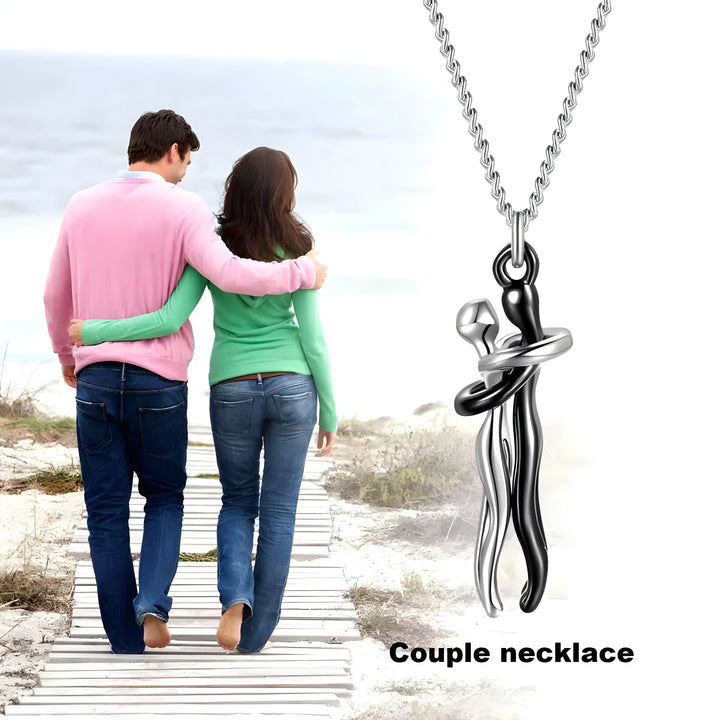 Couple necklace with silver and black intertwined figures, minimalist design for everyday wear