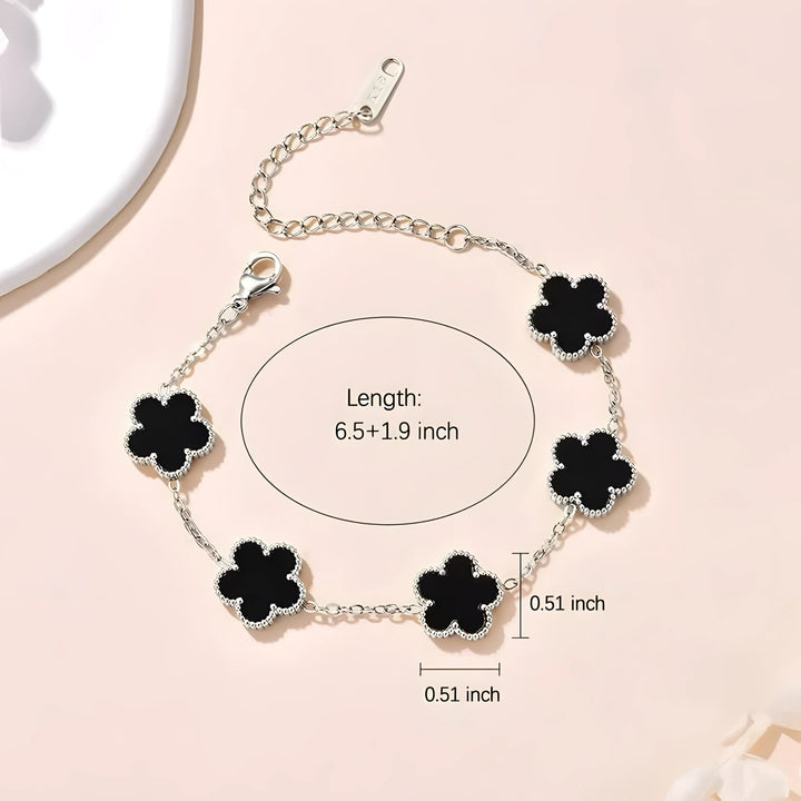 Silver clover bracelet with black enamel charms, minimalist design, 6.5+1.9 inch length