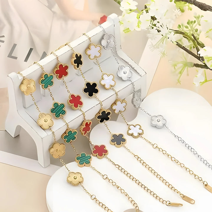 Gold and silver clover pendant necklaces in red, green, black, white, and gold tones, minimalist style