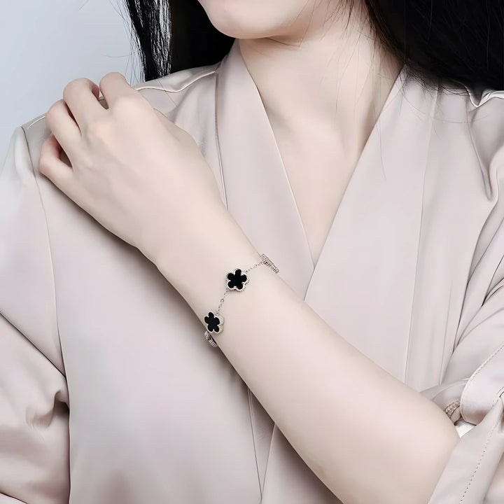 Silver clover bracelet with black enamel, minimalist design for everyday wear