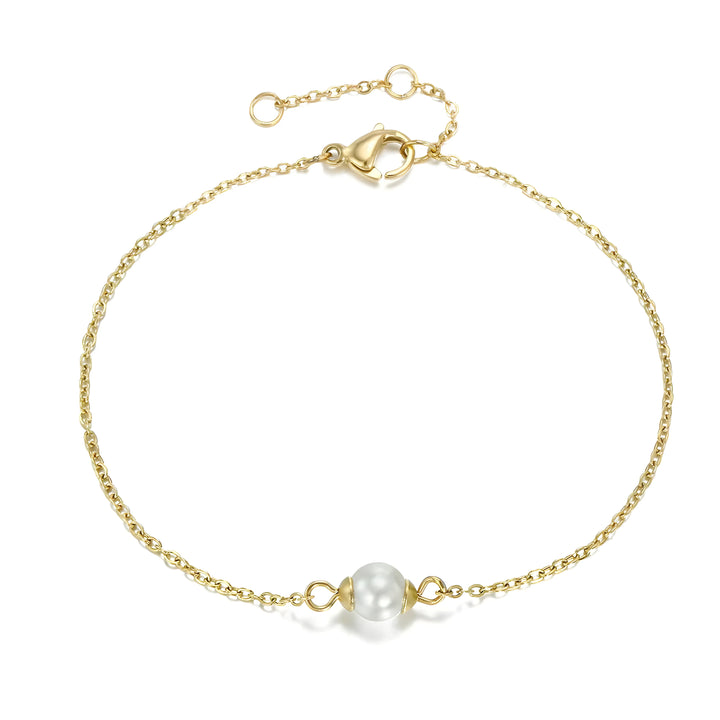 Gold chain bracelet with single pearl, minimalist design, yellow gold tone, elegant everyday jewelry