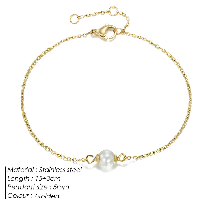 Golden stainless steel bracelet with single pearl pendant, minimalist design for everyday wear