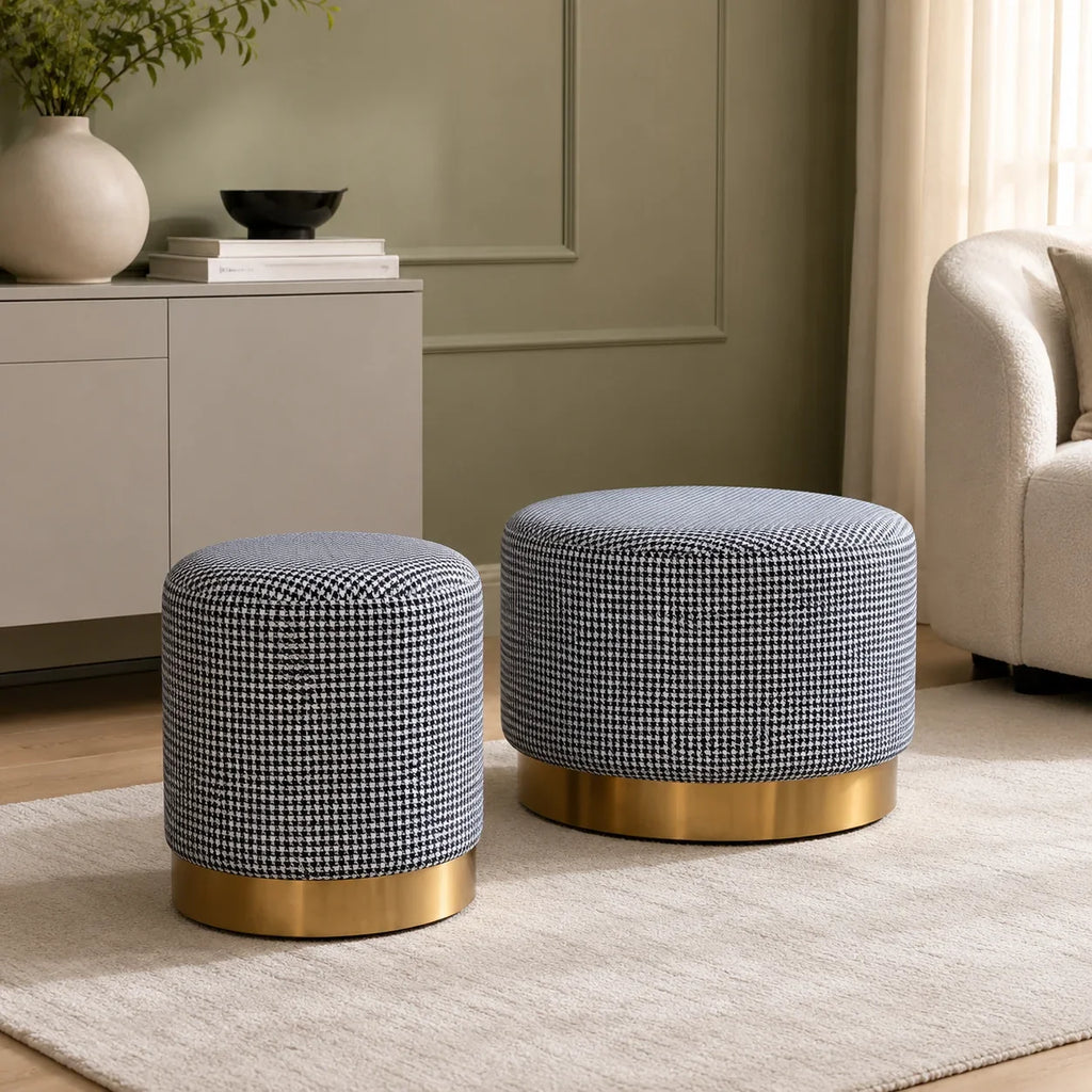 Round houndstooth fabric ottomans with gold metal bases for living room seating or decor