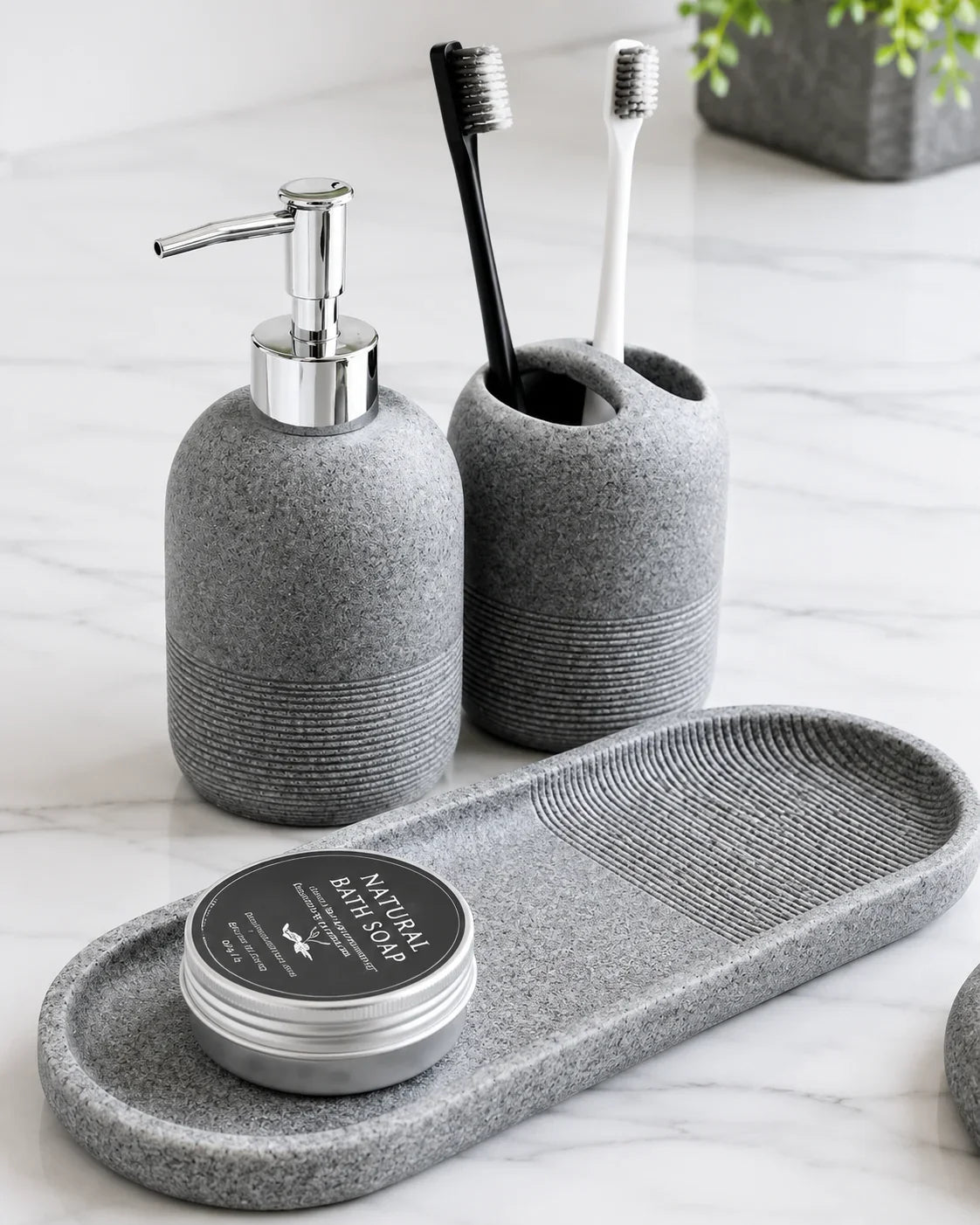Gray textured bathroom set with soap dispenser, toothbrush holder, and soap tray for modern home organization