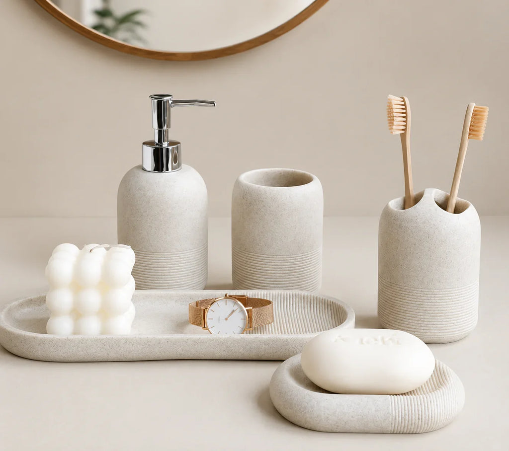 Beige textured bathroom set with soap dispenser, toothbrush holder, tray, and soap dish for modern organization
