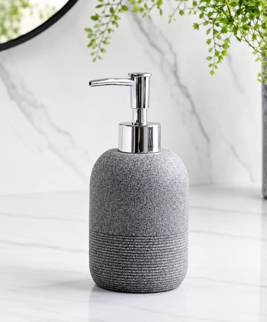 Gray textured ceramic soap dispenser with chrome pump for bathroom or kitchen use