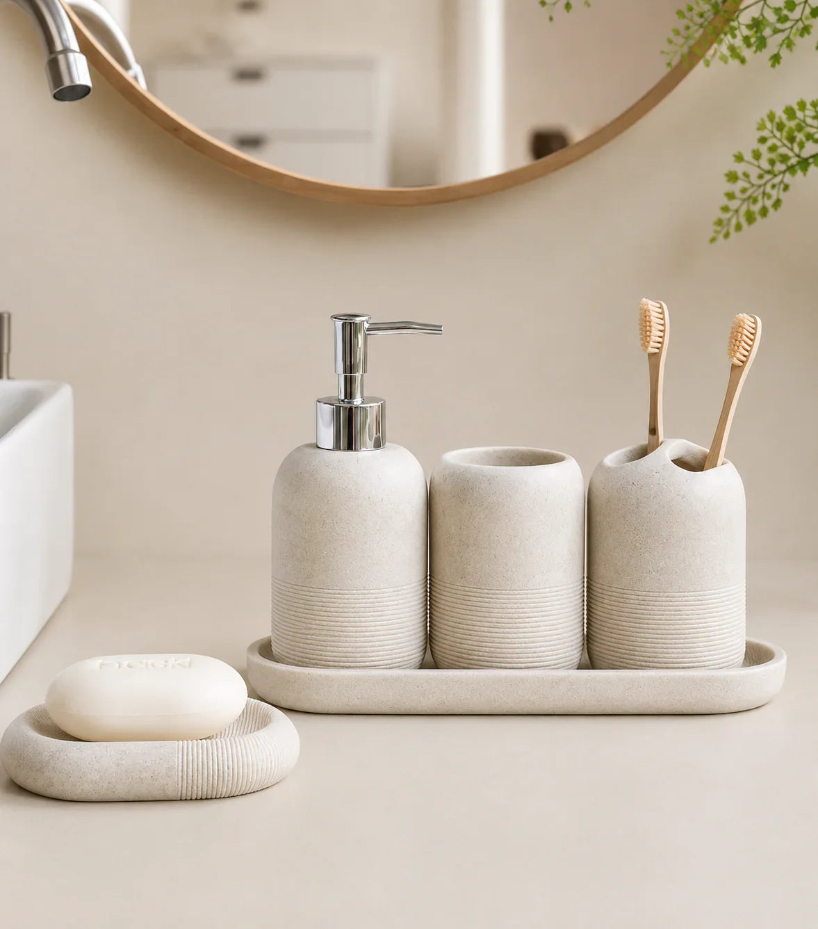 Beige ceramic bathroom set with soap dispenser, toothbrush holder, and soap dish for modern organization