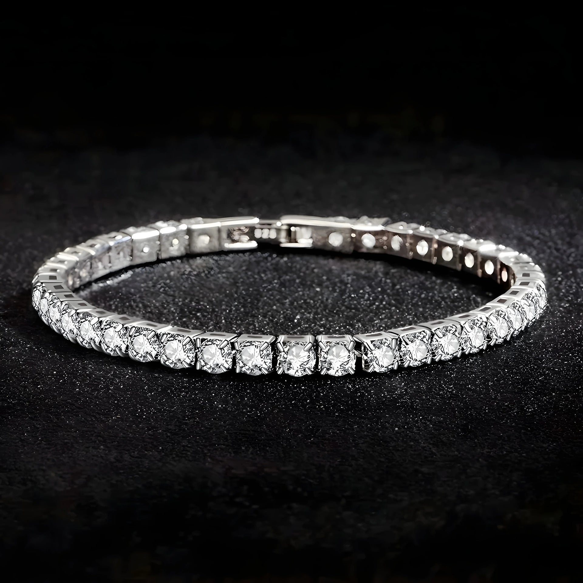 Silver tennis bracelet with clear cubic zirconia stones, minimalist design on black background