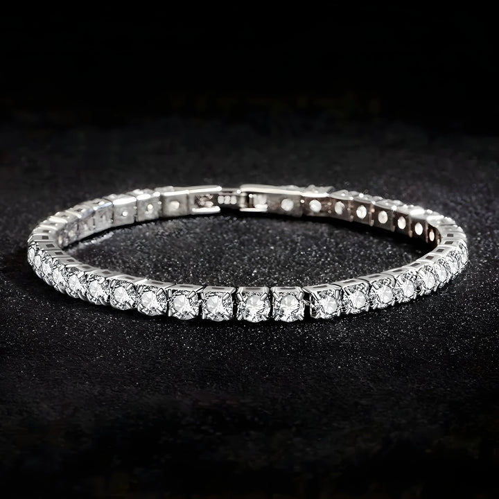 Silver tennis bracelet with clear cubic zirconia stones, minimalist design on black background