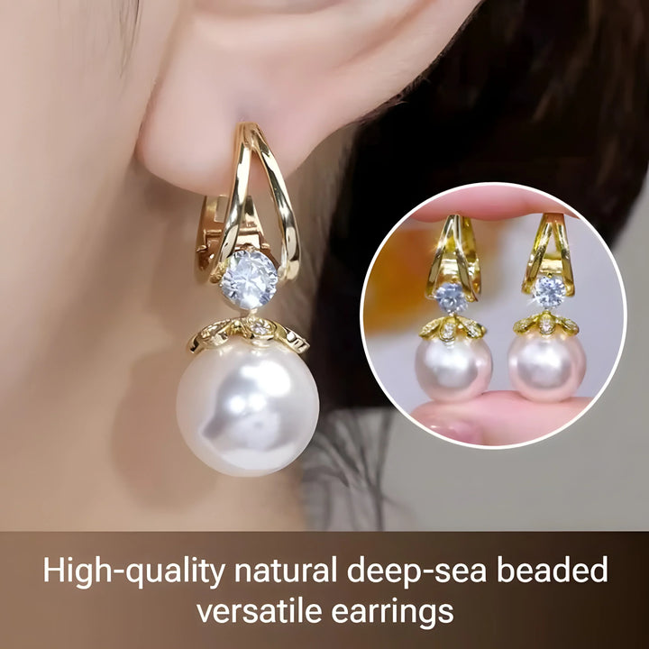 Gold pearl drop earrings with crystal accent, minimalist style for everyday wear