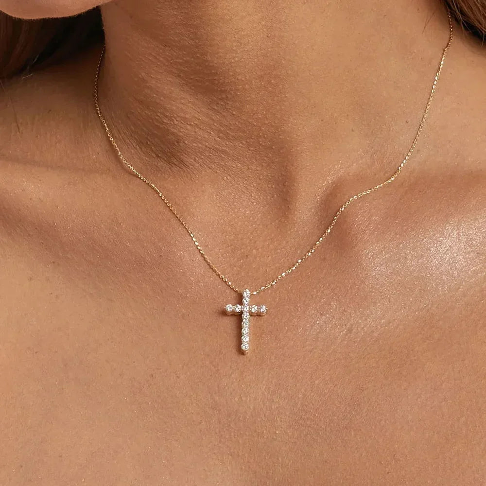Gold cross necklace with diamond accents, minimalist style for everyday wear