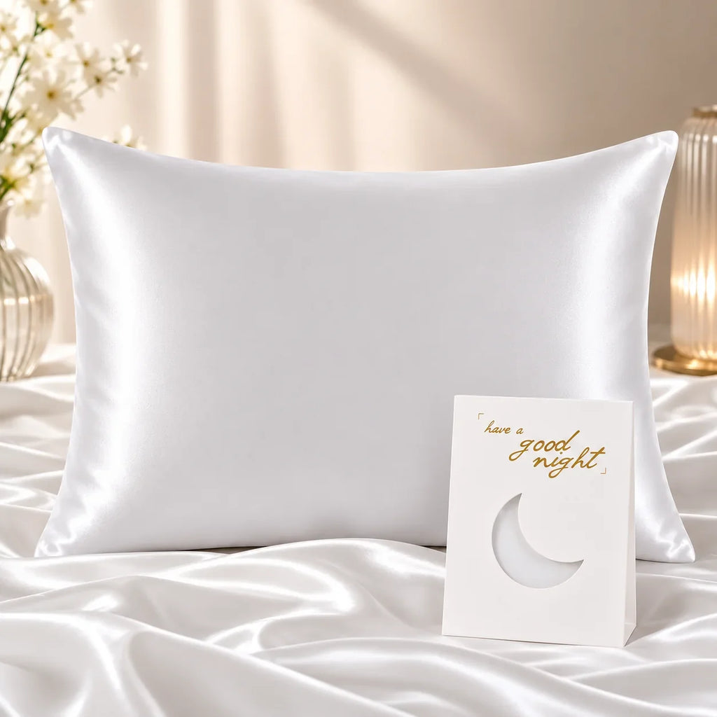 White satin pillowcase on bed with moon card, for luxury bedroom sleep comfort