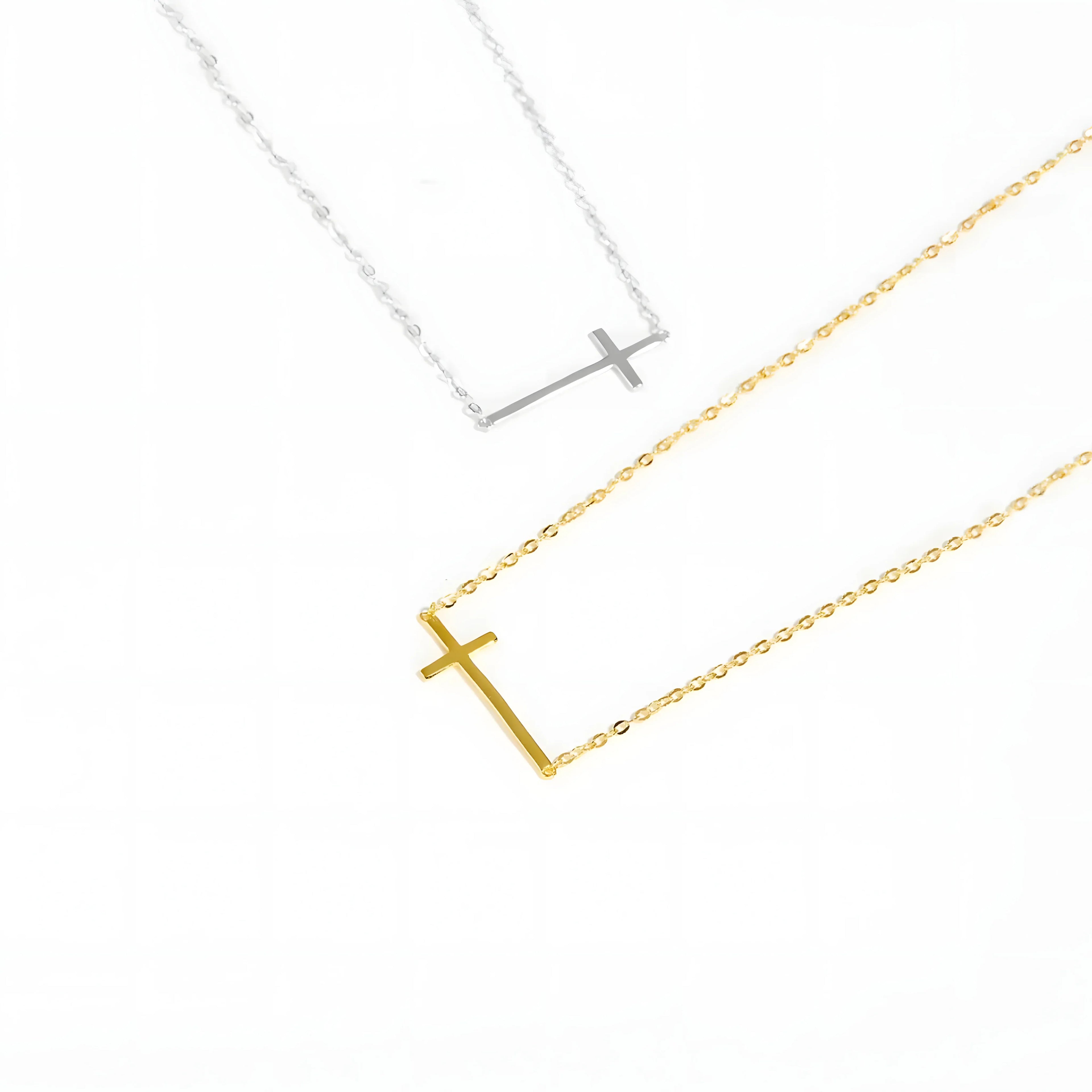 Sterling silver and gold cross necklaces, minimal style, horizontal bar pendant, on white background.