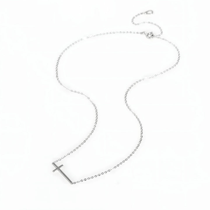 Sterling Silver Cross Necklace, minimalist jewelry with delicate silver chain and simple cross pendant.