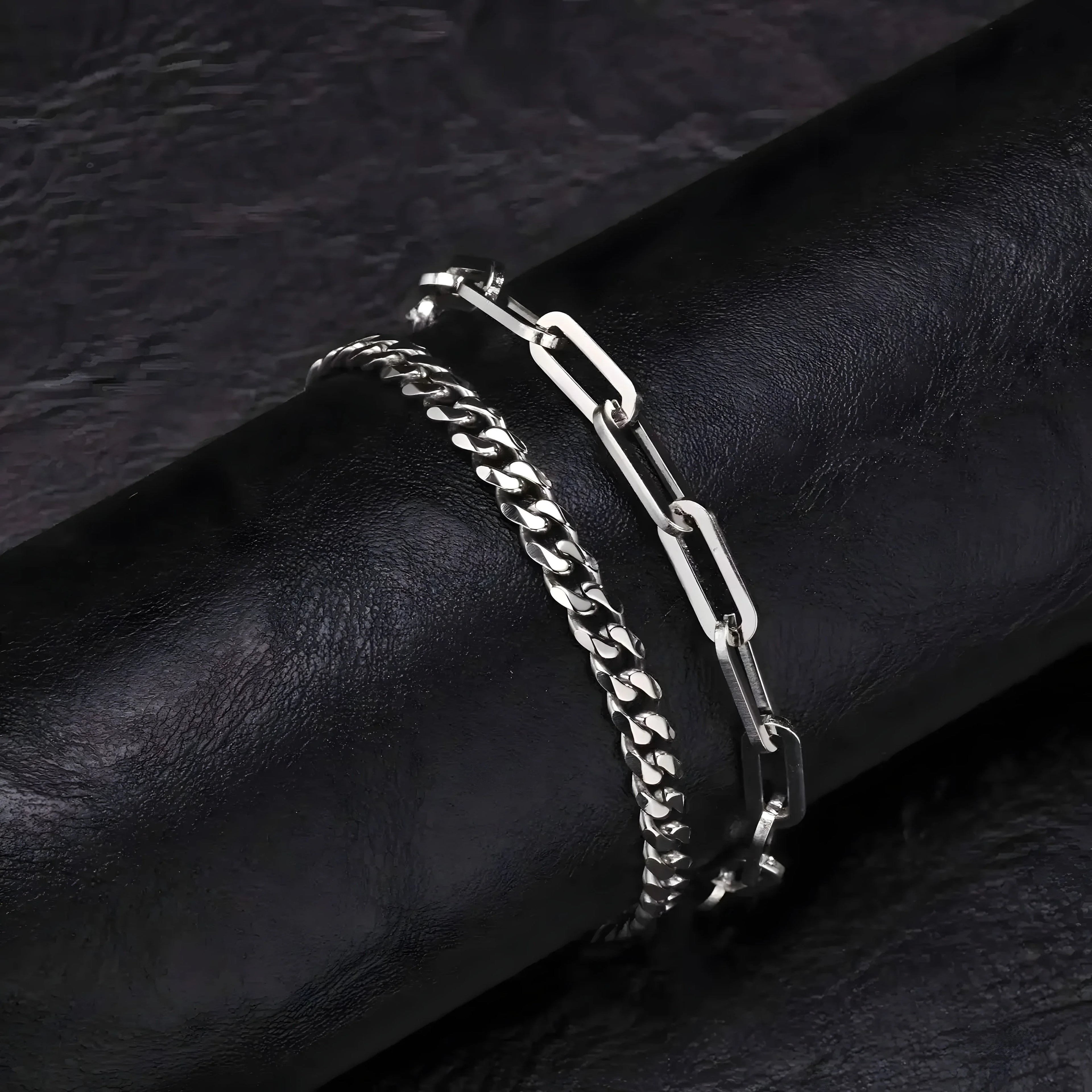 Silver chain link bracelet with minimalist design, sleek metal finish, and modern style