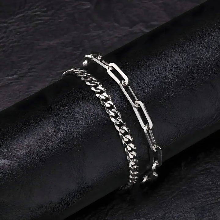 Silver chain link bracelet with minimalist design, sleek metal finish, and modern style