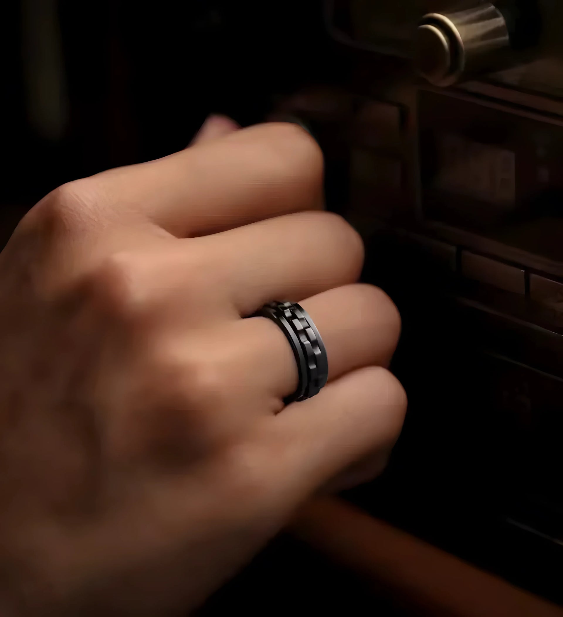 Black titanium ring with geometric pattern, minimalist men's jewelry
