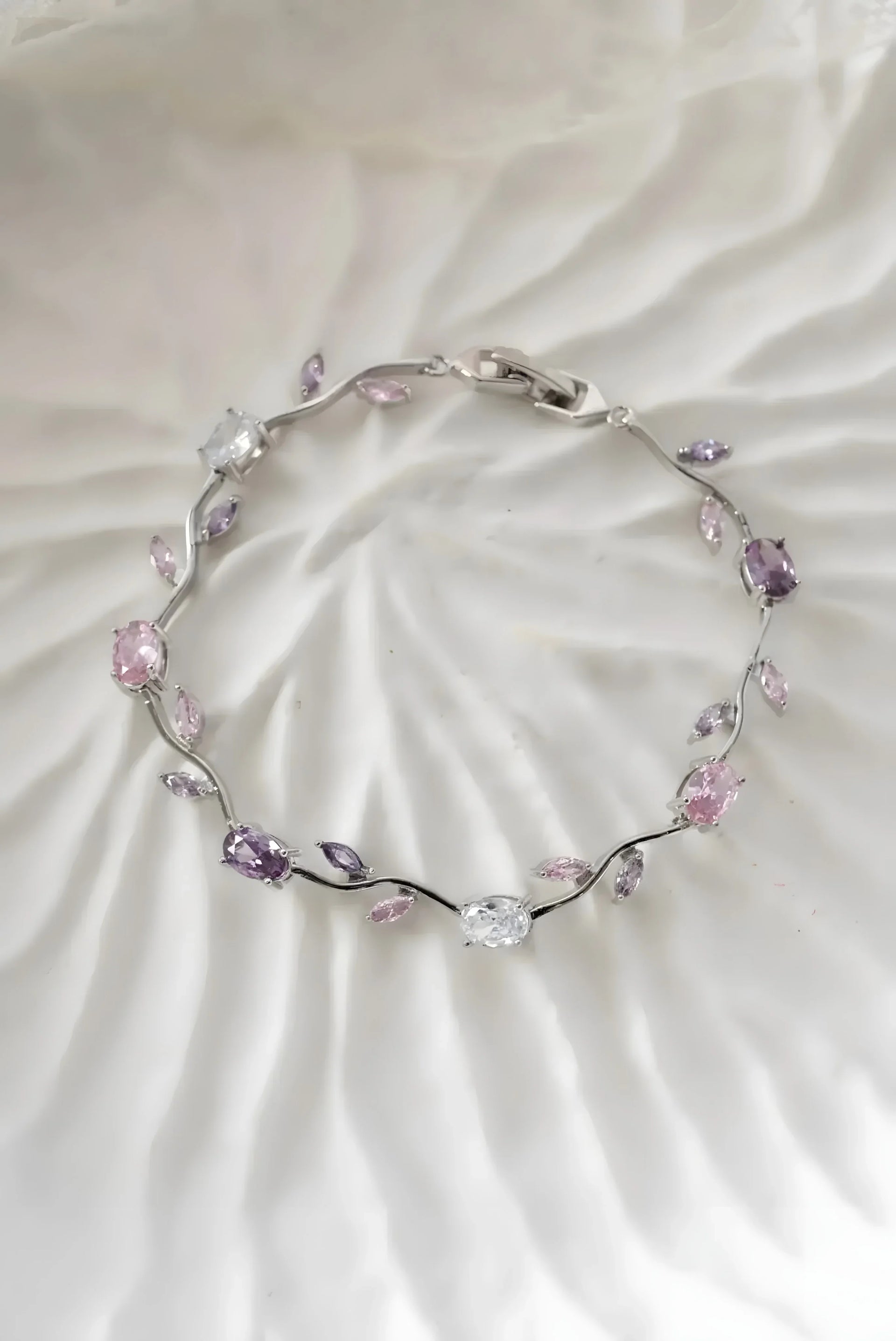Elegant silver bracelet with pink and purple gemstones, minimalist design for everyday wear