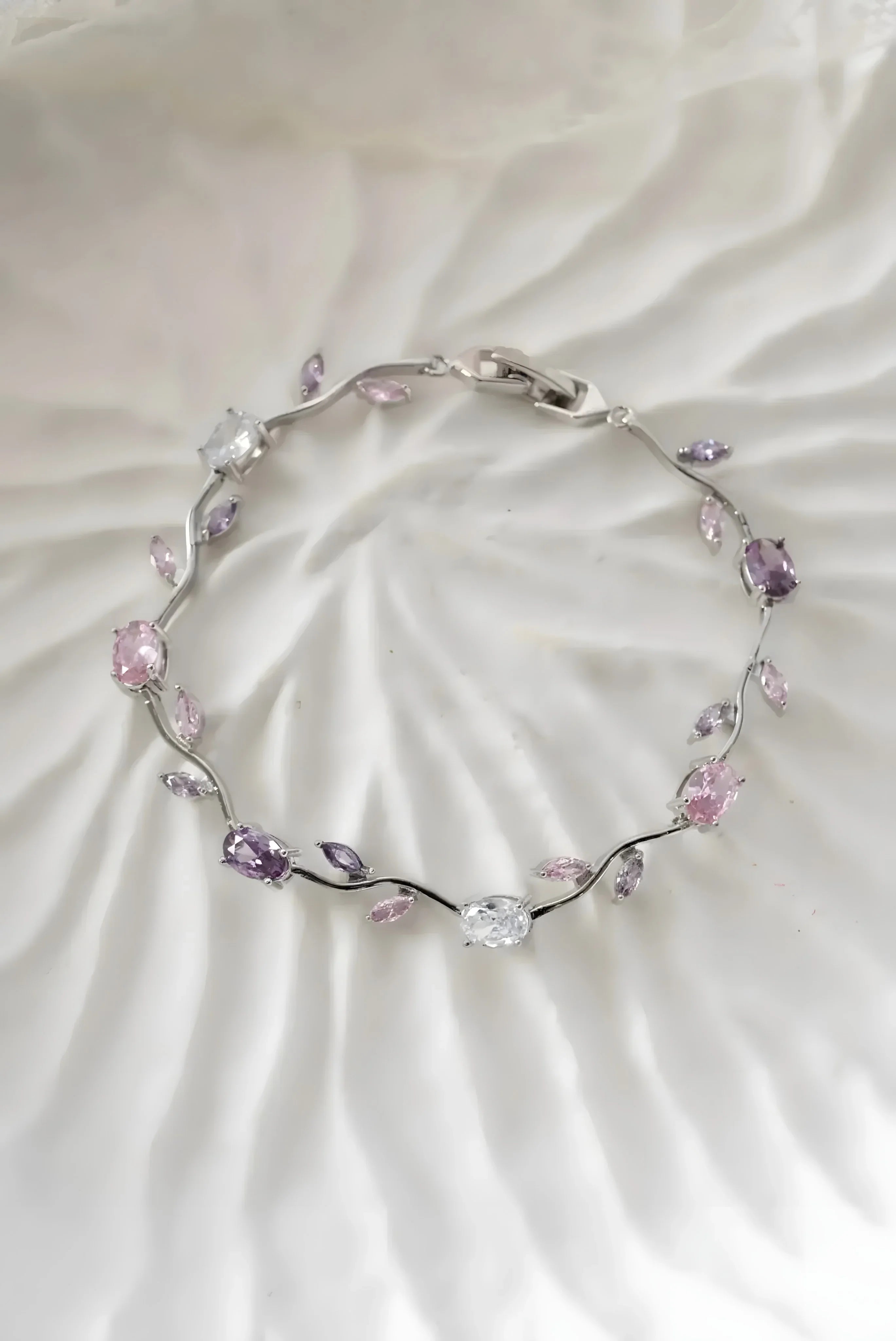 Elegant silver bracelet with pink and purple gemstones, minimalist design for everyday wear