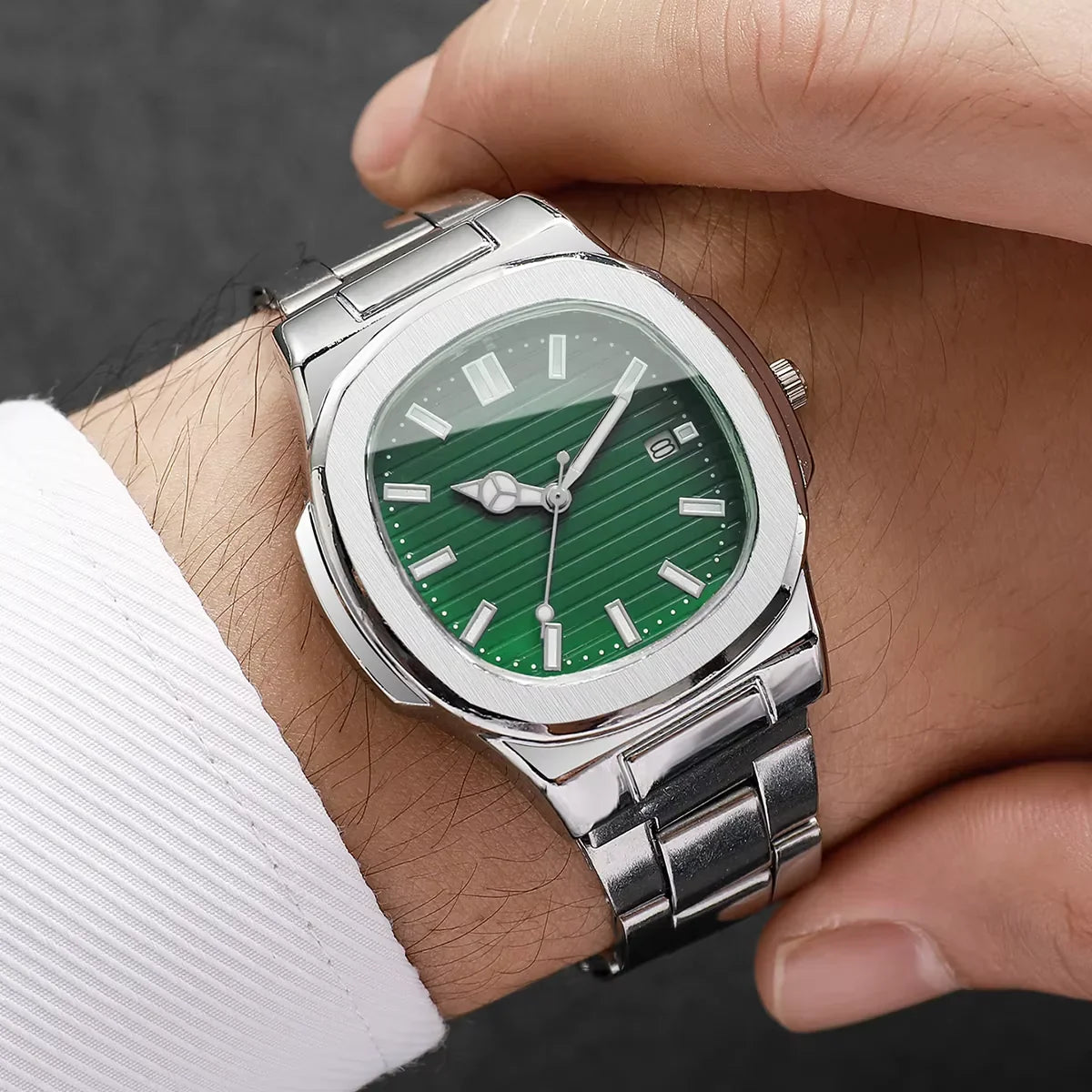 Velqo Essential Steel Watch with silver stainless steel band, green dial, and minimalist style